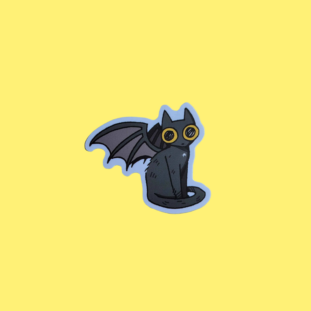 A cartoon illustration of a black cat with bat wings.