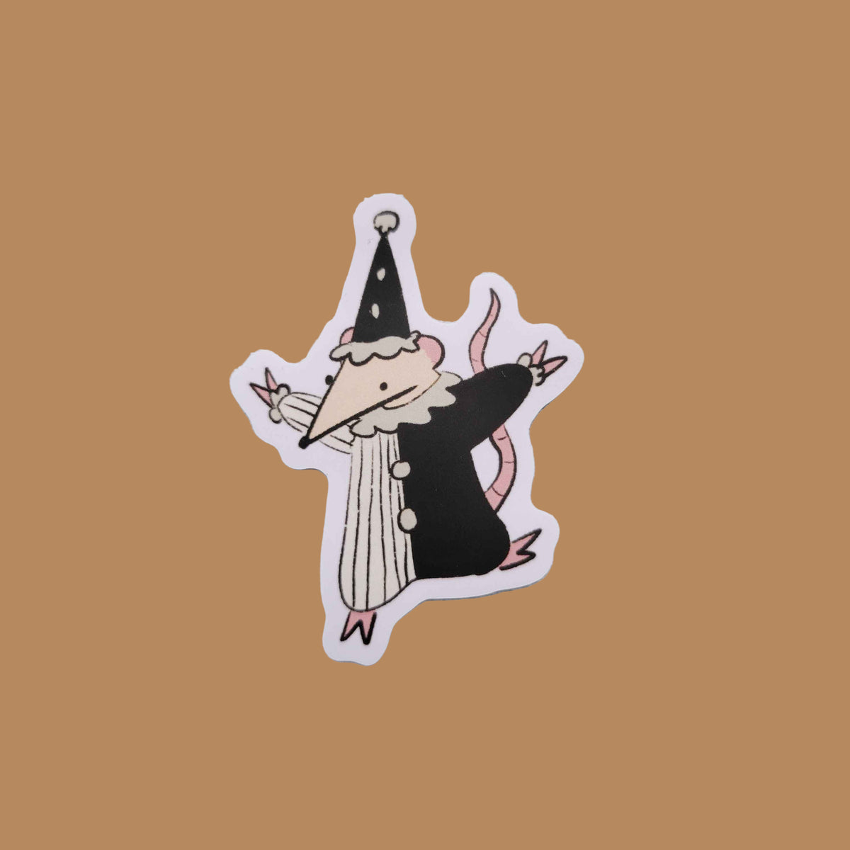 Sticker of a cartoon rat in a black and white peirrot clown costume